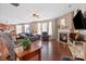 Relaxing living room with hardwood floors, fireplace, and comfortable seating at 112 Artisan Ct, Mooresville, NC 28117