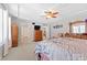 Main bedroom with a large bed, dresser, and access to bathroom at 112 Artisan Ct, Mooresville, NC 28117