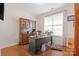 Home office with built-in cabinetry and hardwood floors at 112 Artisan Ct, Mooresville, NC 28117