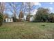 Large backyard with shed and plenty of green space at 12408 High Valley Ln, Charlotte, NC 28269