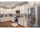Modern kitchen featuring stainless steel appliances, granite countertops, and ample cabinet space for storage at 1370 Null Rd, Lincolnton, NC 28092