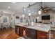 Well-equipped kitchen featuring granite countertops, stainless steel appliances, and an open design concept at 1370 Null Rd, Lincolnton, NC 28092