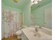 Bathroom with shower/tub combo and floral curtain at 1385 The Xing, Rock Hill, SC 29732