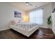 Bedroom with a queen-size bed and hardwood floors at 15618 Aviary Orchard Way, Charlotte, NC 28278