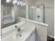 Bathroom with a shower, bathtub, and a vanity with a large mirror at 1817 Duke Adam St, Kannapolis, NC 28083