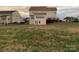 Spacious backyard with a large grassy area behind the house at 1916 Seefin Ct, Indian Trail, NC 28079