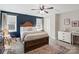 Charming bedroom with a blue accent wall and wood bed at 3912 13Th Ne St, Hickory, NC 28601