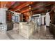 Island kitchen with custom cabinetry and a farmhouse sink at 4707 Sugar And Wine Rd, Monroe, NC 28110