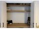 Neat closet with shelves and a workspace at 4924 Sardis Rd # E, Charlotte, NC 28270