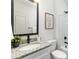 Clean bathroom with single vanity and granite countertop at 5517 Skycrest Dr, Charlotte, NC 28269