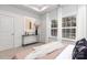 Bedroom with cozy bedding and a window showcasing the outdoors at 5517 Skycrest Dr, Charlotte, NC 28269