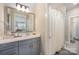 Modern bathroom with gray vanity and white shower curtain at 636 Bucks Quarry Ct, Fort Mill, SC 29708