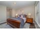 Relaxing bedroom with wood furniture and neutral decor at 636 Bucks Quarry Ct, Fort Mill, SC 29708