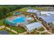 Community pool, clubhouse, and surrounding homes are shown in this aerial view at 7029 Overjoyed Xing, Charlotte, NC 28215
