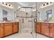 Elegant bathroom with double vanity and large shower at 7029 Overjoyed Xing, Charlotte, NC 28215