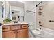 Clean bathroom with a tub shower combo and modern vanity at 7029 Overjoyed Xing, Charlotte, NC 28215