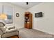 Relaxing bedroom featuring a bookshelf and comfortable seating at 7029 Overjoyed Xing, Charlotte, NC 28215