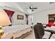 Spacious bedroom with a sitting area and access to an outdoor space at 7029 Overjoyed Xing, Charlotte, NC 28215