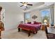 Spacious primary bedroom with carpeted floor and large windows at 7029 Overjoyed Xing, Charlotte, NC 28215