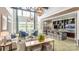 Relaxing clubhouse with comfortable seating, bar, and large screen TV at 7029 Overjoyed Xing, Charlotte, NC 28215