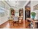Charming dining area with hardwood floors and built-in shelving at 7029 Overjoyed Xing, Charlotte, NC 28215