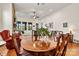Spacious dining area with hardwood floors and views to living room at 7029 Overjoyed Xing, Charlotte, NC 28215