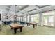 Well-equipped game room with pool tables and ample space for residents at 7029 Overjoyed Xing, Charlotte, NC 28215
