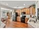 Modern kitchen with stainless steel appliances and granite countertops at 7029 Overjoyed Xing, Charlotte, NC 28215