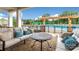 Comfortable patio furniture with a view of the community pool at 7029 Overjoyed Xing, Charlotte, NC 28215