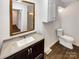 Bathroom with updated vanity and neutral-colored flooring at 801 Crestridge Rd, Statesville, NC 28677