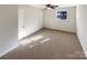 Charming bedroom with neutral decor and carpet flooring at 801 Crestridge Rd, Statesville, NC 28677