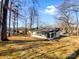 House exterior showcasing a screened porch at 801 Crestridge Rd, Statesville, NC 28677
