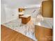 Updated kitchen featuring an island and marble floors at 801 Crestridge Rd, Statesville, NC 28677