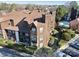 Aerial view showcasing condo building, pool, and parking at 8103 Cedar Glen Dr, Charlotte, NC 28212