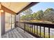 Balcony with wooded views and sliding glass doors at 8103 Cedar Glen Dr, Charlotte, NC 28212