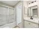 Updated bathroom with a new vanity and walk-in shower at 8103 Cedar Glen Dr, Charlotte, NC 28212