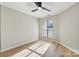 Bright bedroom with wood flooring and ceiling fan at 8103 Cedar Glen Dr, Charlotte, NC 28212