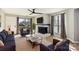 Bright living room features a fireplace, hardwood floors, and ample natural light at 8103 Cedar Glen Dr, Charlotte, NC 28212