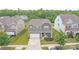 Aerial view of two story house and neighborhood at 8219 Pamplin Ct, Charlotte, NC 28273