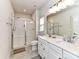 Modern bathroom with double vanity and walk-in shower at 8825 Chapel Grove Crossing Dr, Huntersville, NC 28078