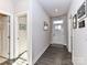 Spacious foyer with wood-look floors and white walls at 8825 Chapel Grove Crossing Dr, Huntersville, NC 28078