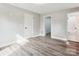 Bright bedroom with vinyl flooring and access to the bathroom at 1105 Stanback Rd, Chester, SC 29706