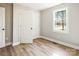 Spacious bedroom with hardwood floors and a large window at 1105 Stanback Rd, Chester, SC 29706