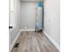 Functional laundry room with vinyl flooring and new water heater at 1105 Stanback Rd, Chester, SC 29706