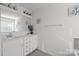 Double vanity bathroom with a large mirror and updated fixtures at 11058 Argosy Dr, Lancaster, SC 29720