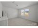 Bright bedroom with large windows and neutral colored carpet at 11058 Argosy Dr, Lancaster, SC 29720