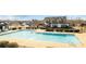 Resort-style community pool with clubhouse in background at 11058 Argosy Dr, Lancaster, SC 29720