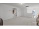 Upstairs hallway with carpet, access to bedrooms and bathroom at 11058 Argosy Dr, Lancaster, SC 29720