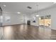 Open living area with hardwood floors, fireplace and sliding doors to patio at 11058 Argosy Dr, Lancaster, SC 29720
