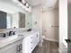 Bathroom with white cabinets and marble countertops at 1324 Crawford Rd # 6, Rock Hill, SC 29730